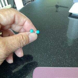 Turquoise stud earrings, set in sterling silver.